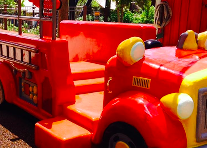 Bright red fire truck play area at Dollywood Firehouse Fun Yard in Owens Farm