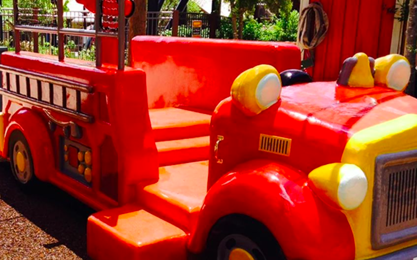 Bright red fire truck play area at Dollywood Firehouse Fun Yard in Owens Farm